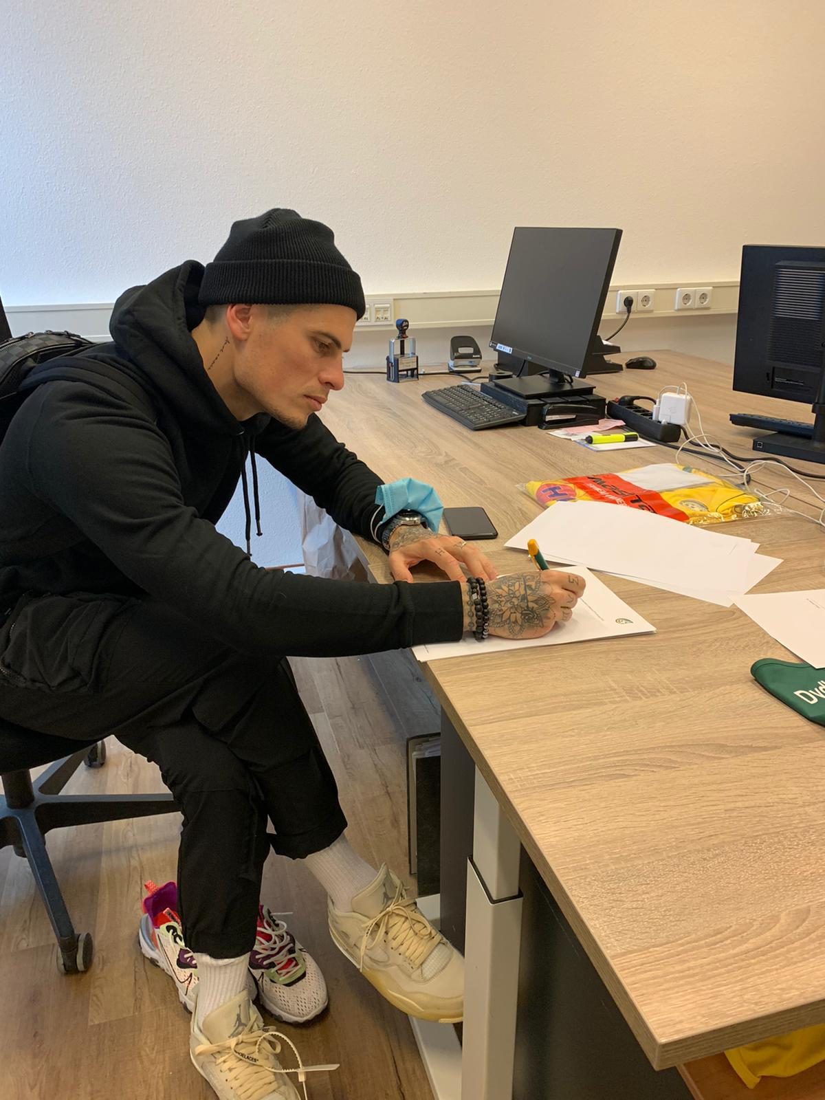 Contract signing at the club offices